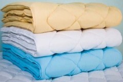 Difficultés de processus: comment laver une couverture en coton à la maison?